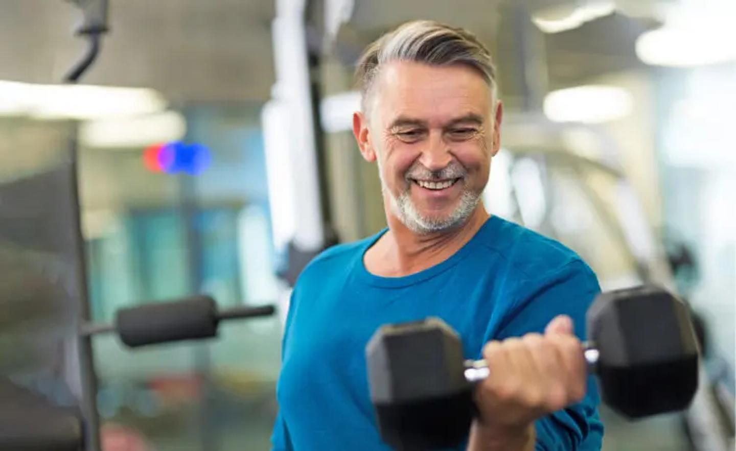 Older adult excited about improving their health through exercise. 